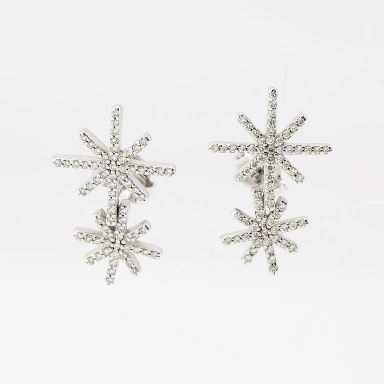 Efva Attling, a pair of "Beam & Stars Two Ear" earrings in rhodium-plated sterling silver with round brilliant-cut diamonds.