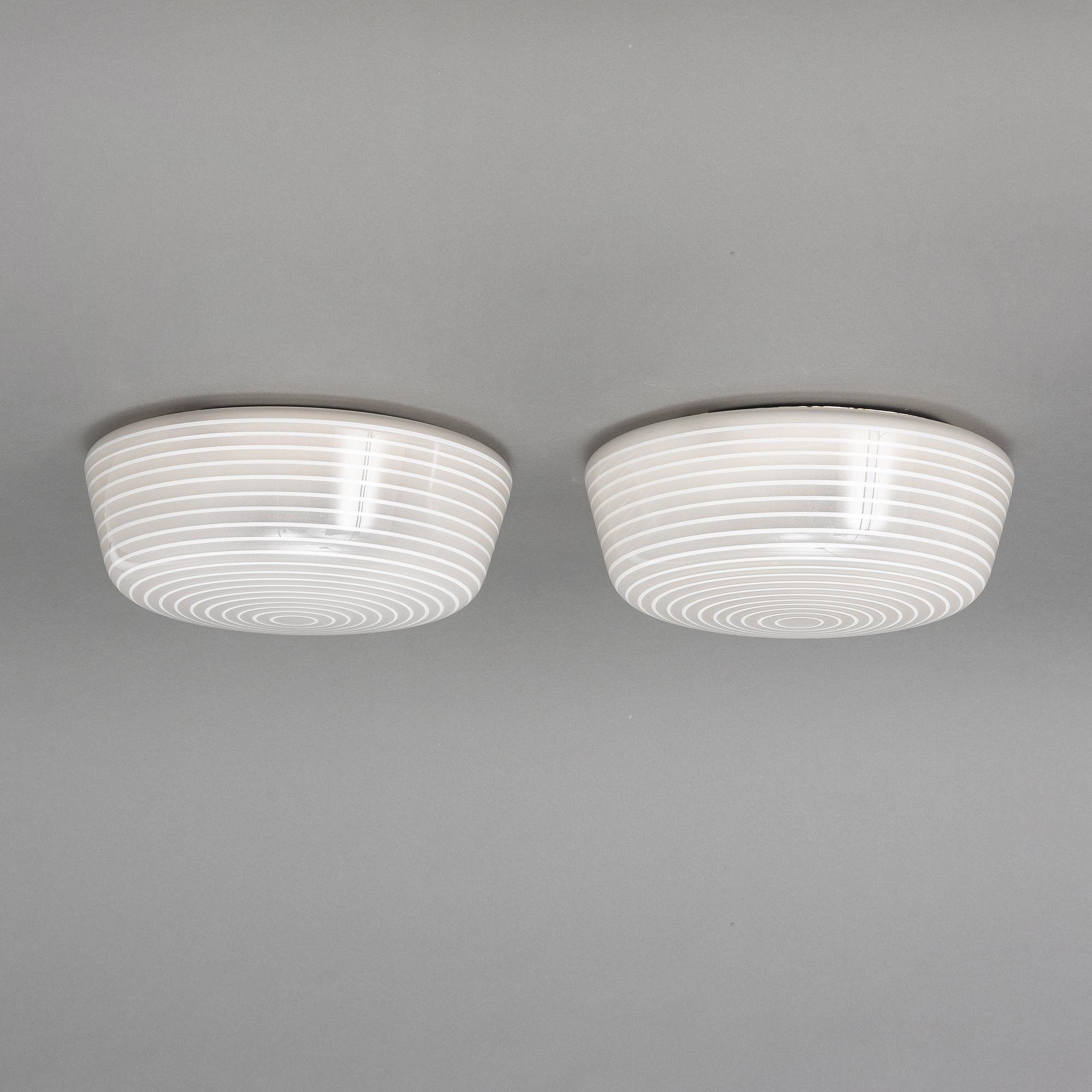 Asea, a pair of functionalist ceiling lamps.