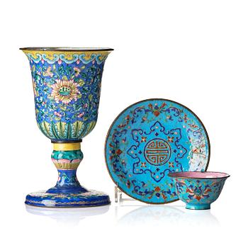 1262. An enamel on copper goblet and cup with stand, Qing dynasty, 18/19th century.