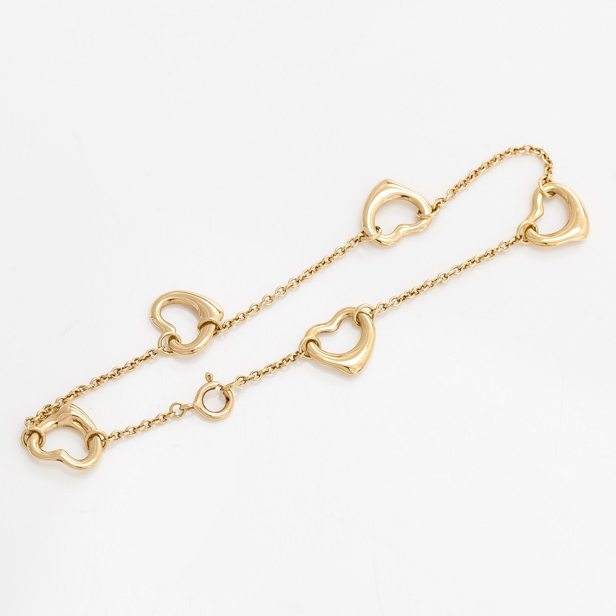 Tiffany & Co, Elsa Peretti, an 18K gold 'Open Heart' bracelet.