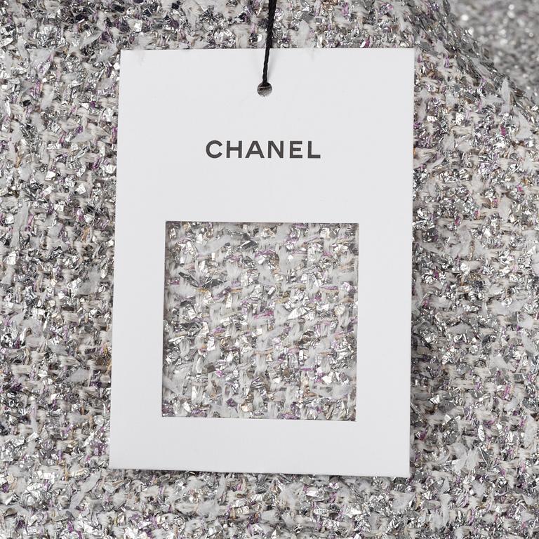 Chanel, a bouclé silver dress, size 34.
