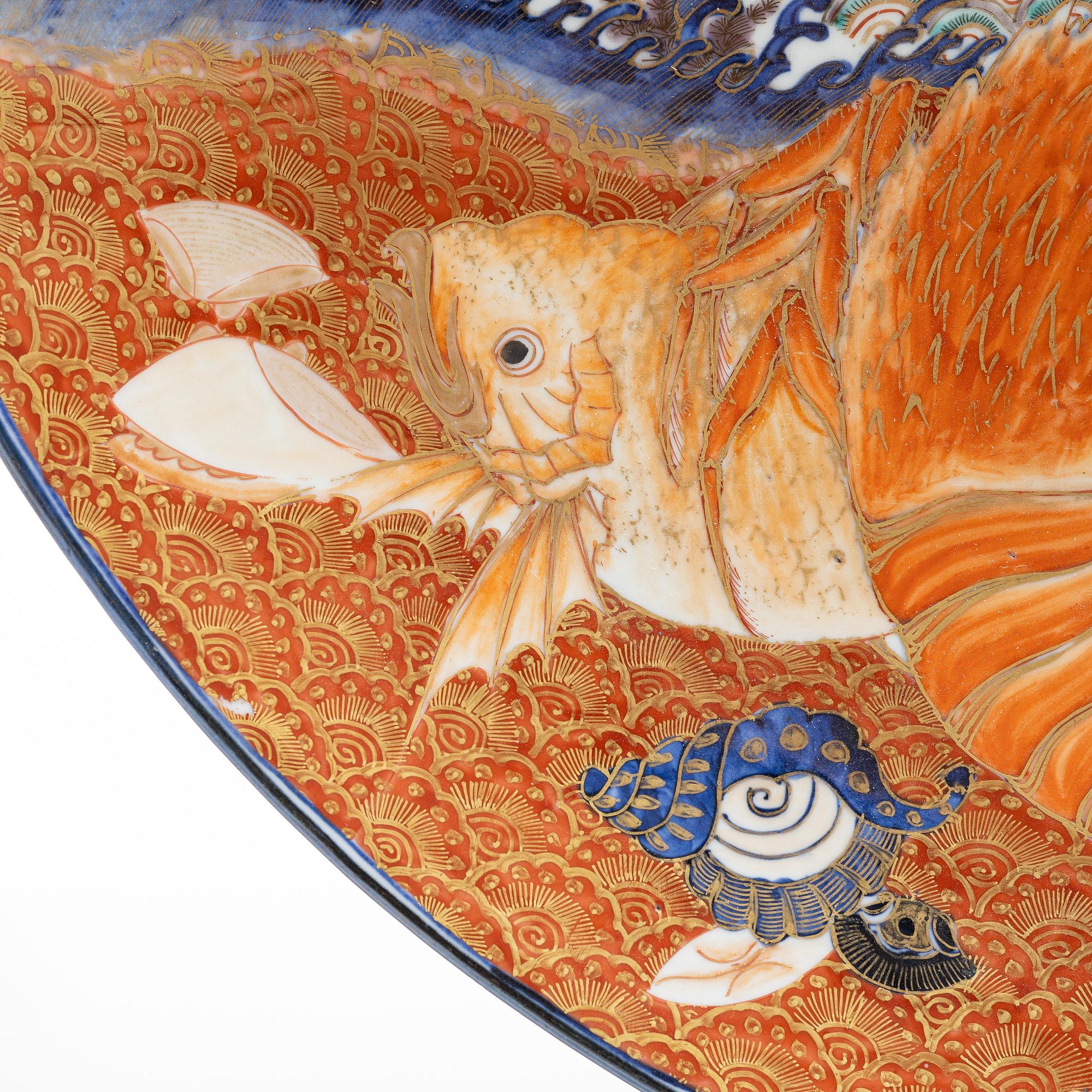 A massive Japanese imari charger, Meiji period (1868-1912). Signed.