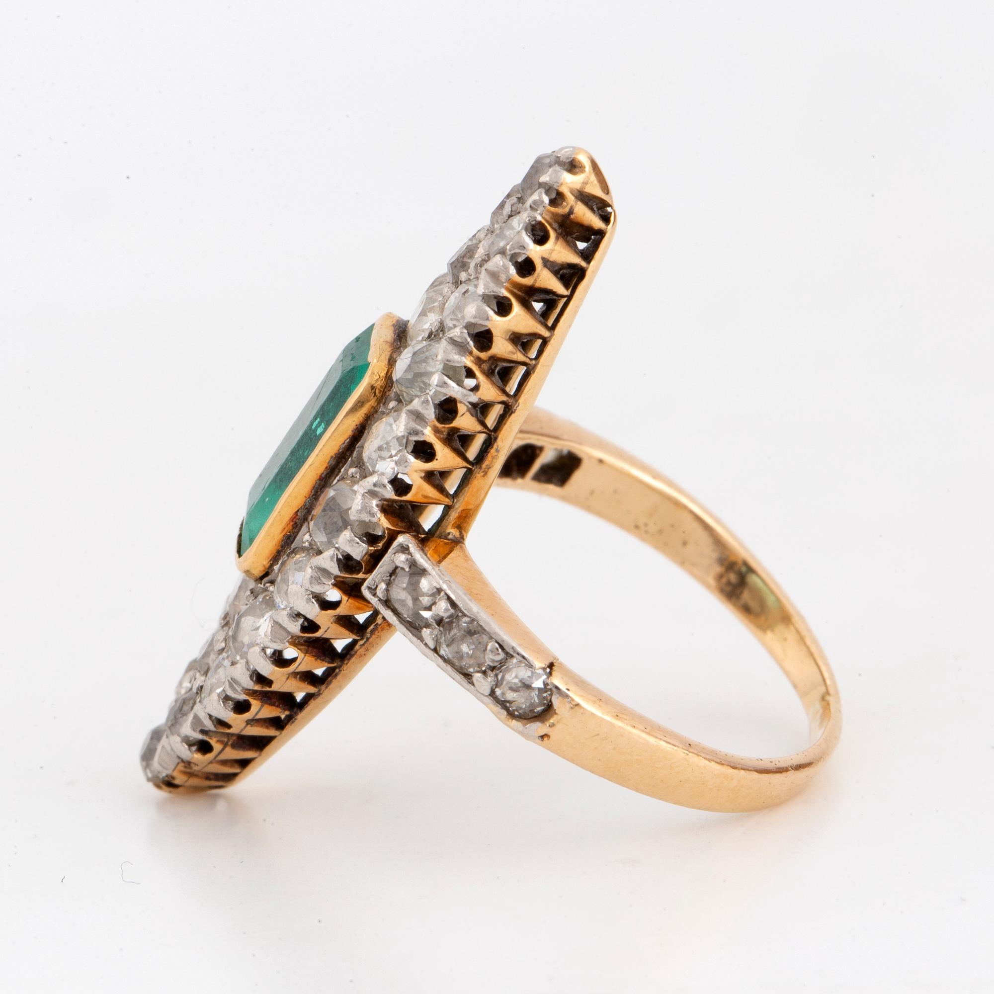 Emerald and old-cut diamond ring.