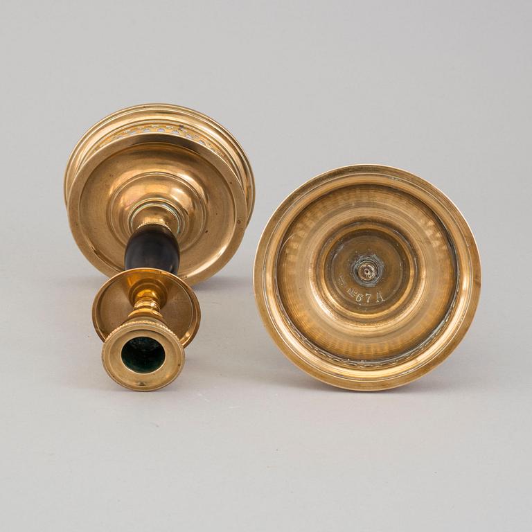 a pair of Skultuna candlesticks from the first half of the 20th century.