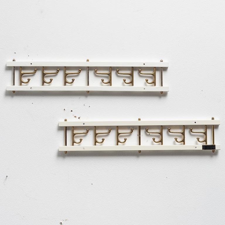 Klädhängare, ett par, "Dekorativ", Skoglunds metallgjuteri, Anderstorp, 1950-/60-tal.