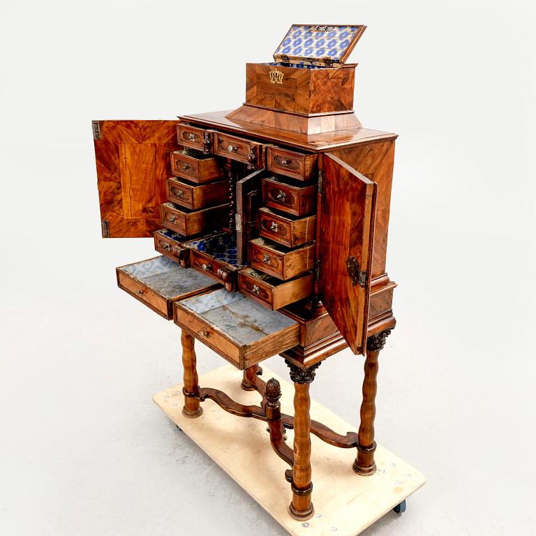 A first half of the 18th century walnut cabinet.