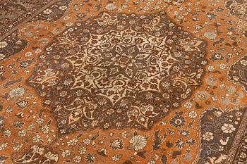 An antique Tabriz carpet, Northwest Persia, 453 x 310 cm.