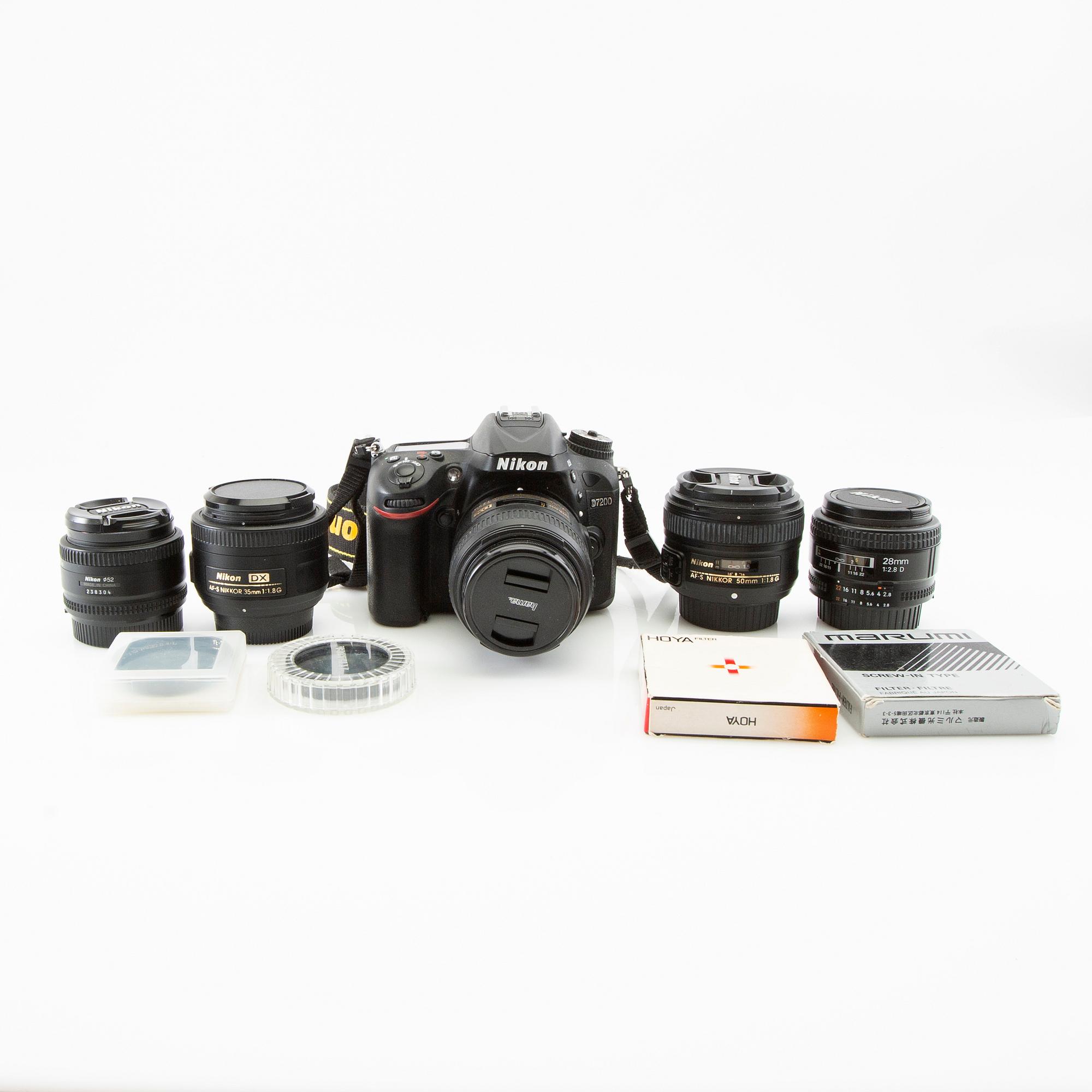 Camera Nikon D7200 along with 5 lenses and a bag.