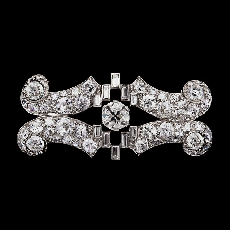 BROSCH, briljant- och baguettslipade diamanter, tot. ca 5 ct.