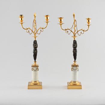 KANDELABRAR, ett par, empirestil, 1900-tal.