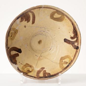 A glazed earthenware bowl, possibly Hispano-Moresque.