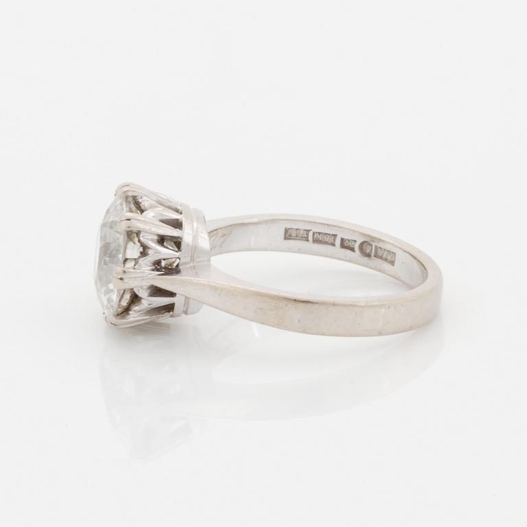 An 18K white gold ring set with a cushion formed old cut-diamond.