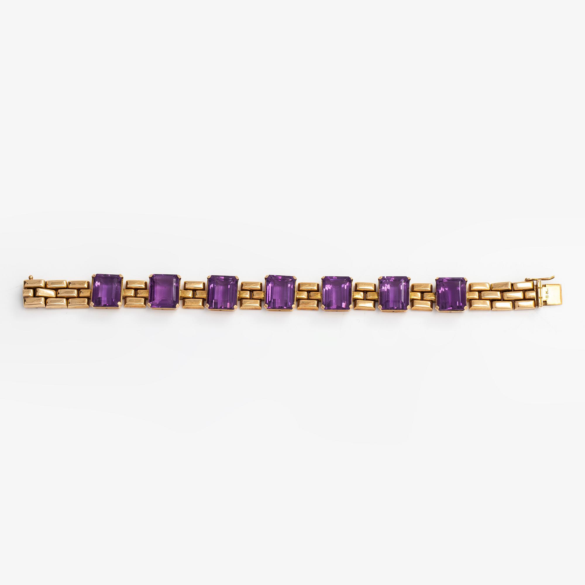 An 18K gold bracelet with amethyst.