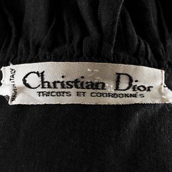 A black cotton blouse by Christian Dior.