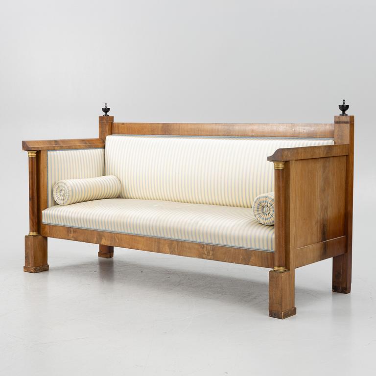 An Empire sofa, first half of the 19th century.