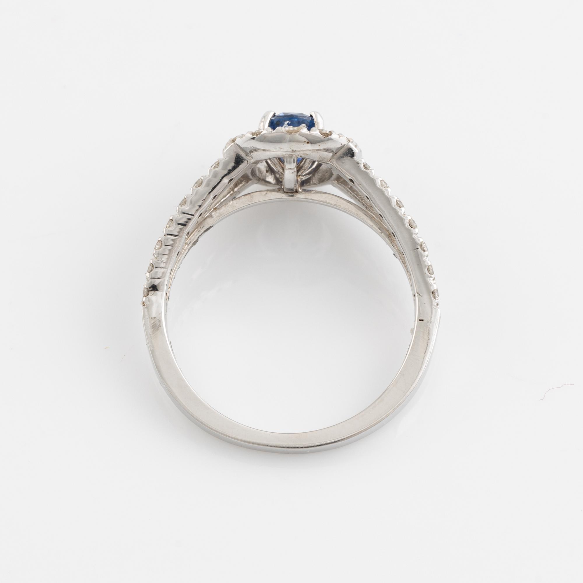 Oval sapphire and brilliant cut diamond ring.