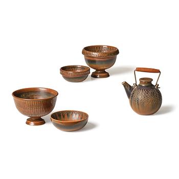 81. a stoneware teapot and 4 bowls, Gustavsberg Studio, Sweden, 1960-63.