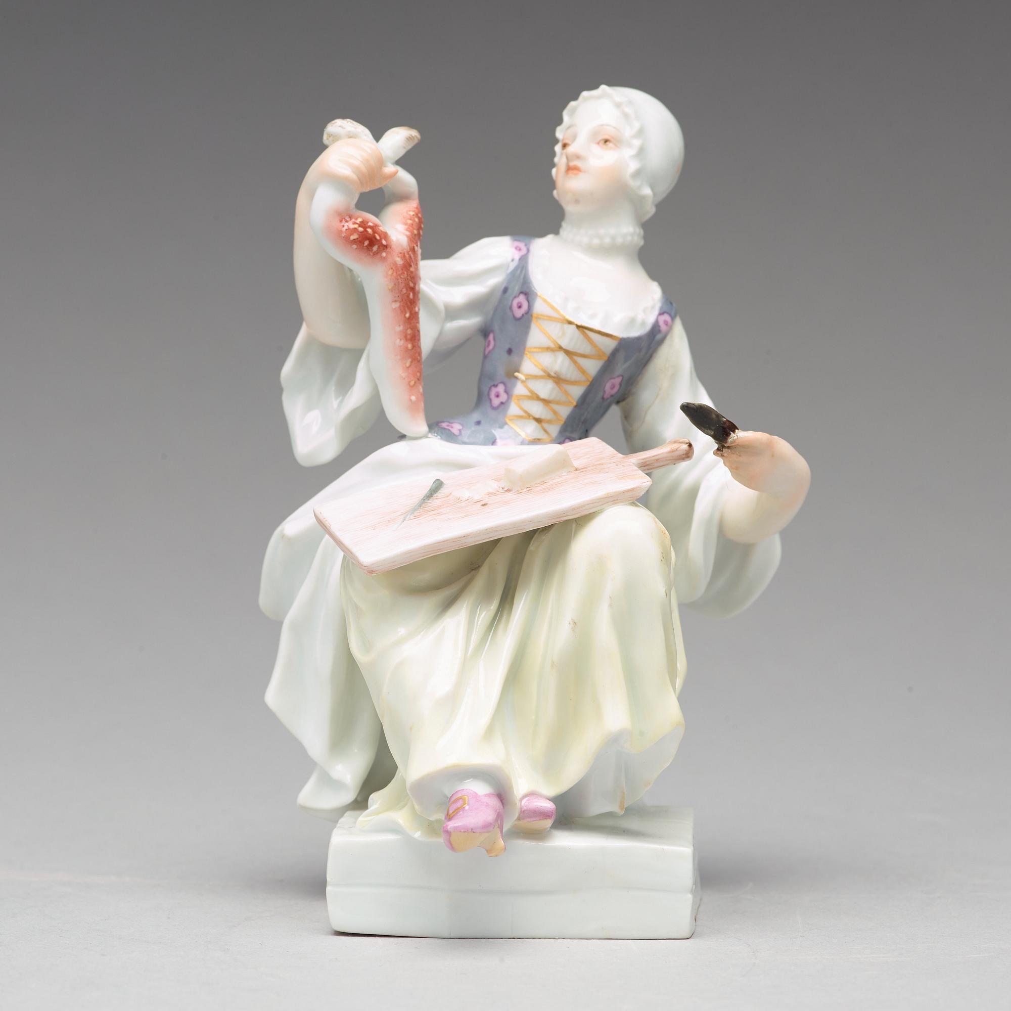 FIGURIN, porslin. "Tillredning av hare". Meissen, 1800-talets andra hälft.