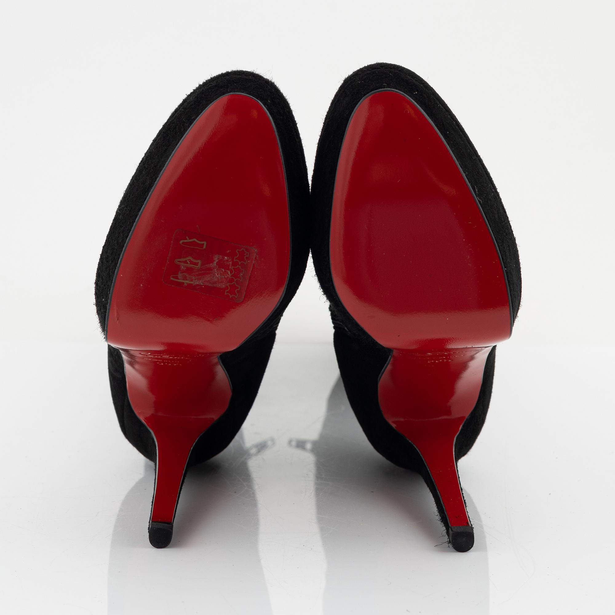 Christian Louboutin, a pair of black suede stiletto boots, size 36 1/2.