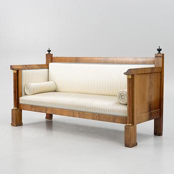 An Empire sofa, first half of the 19th century.
