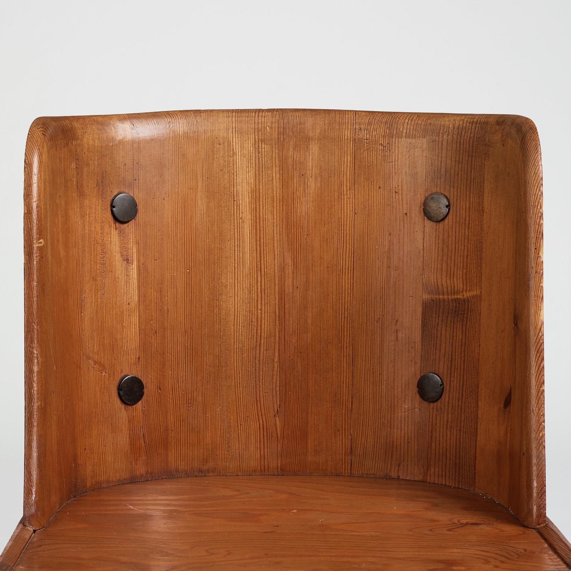 Axel Einar Hjorth, a stained pine low back "Lovö" chair, Nordiska Kompaniet, Sweden 1930's.