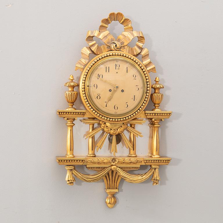 Wall clock, Gustavian style, mid/second half of the 20th century.