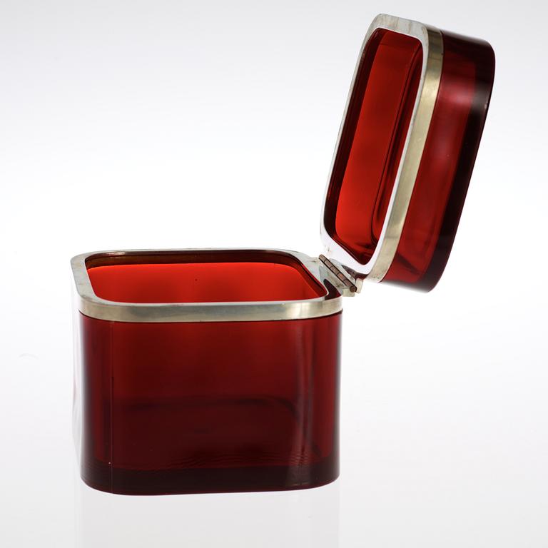 A Josef Frank red glass and pewter box by Svenskt Tenn.