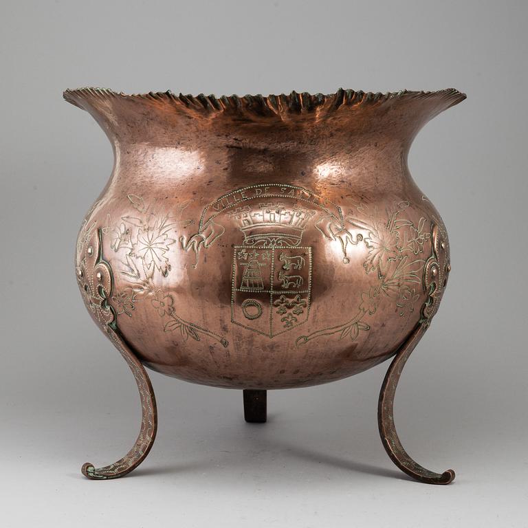 A 19th century copper flower pot.