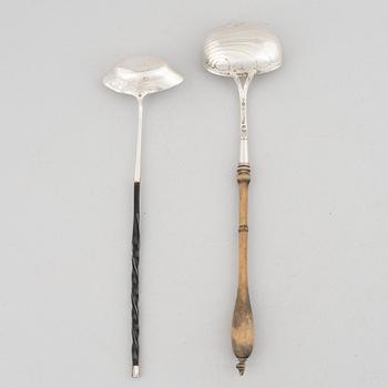 Two Swedish silver soup ladles, late 18th-early 19th Century.