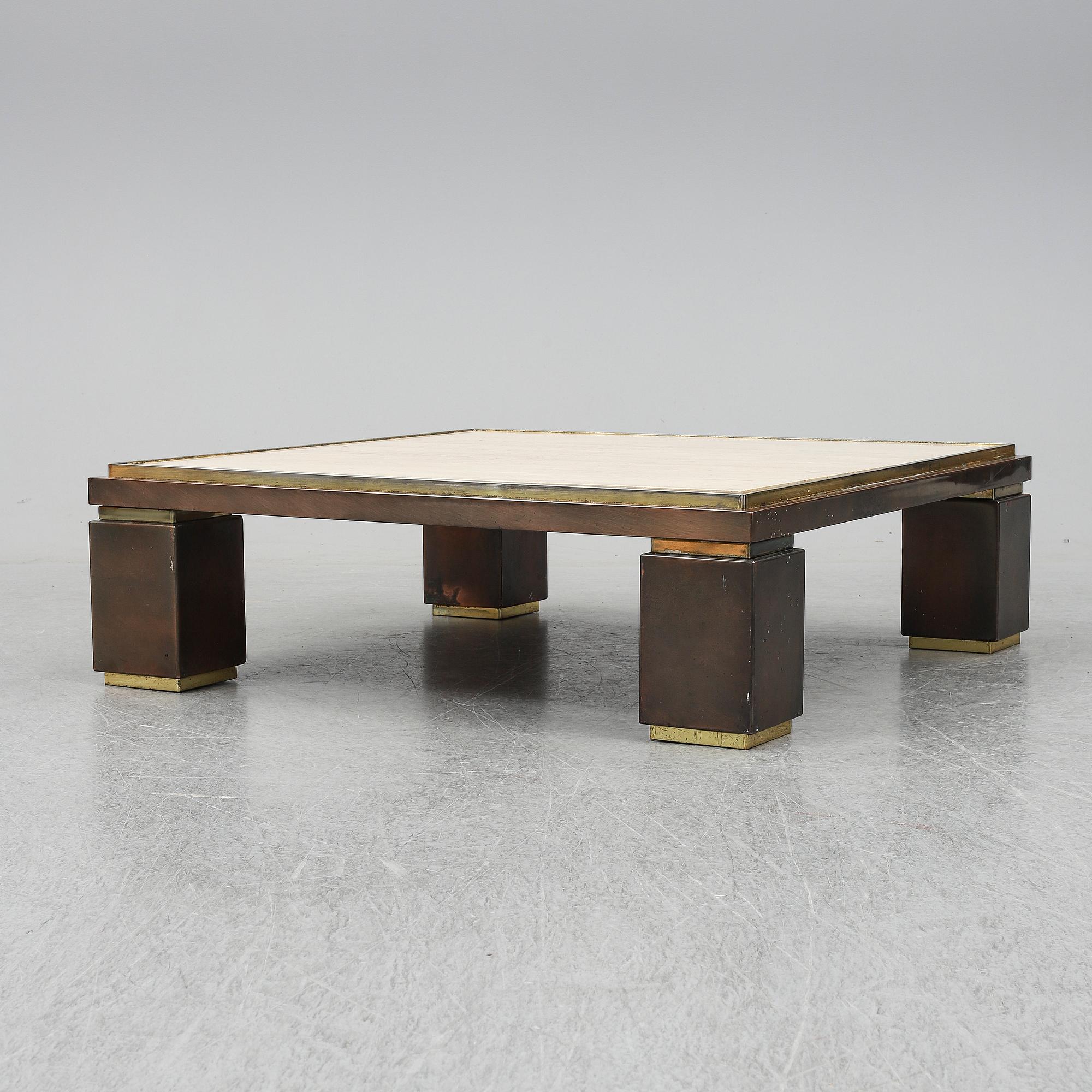 A travetine and brass sofa table, 1970s, probably Belgo Chrome.