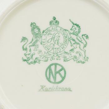A set of 15 porcelain plates from Nordiska Kompaniet, first half 20th century.