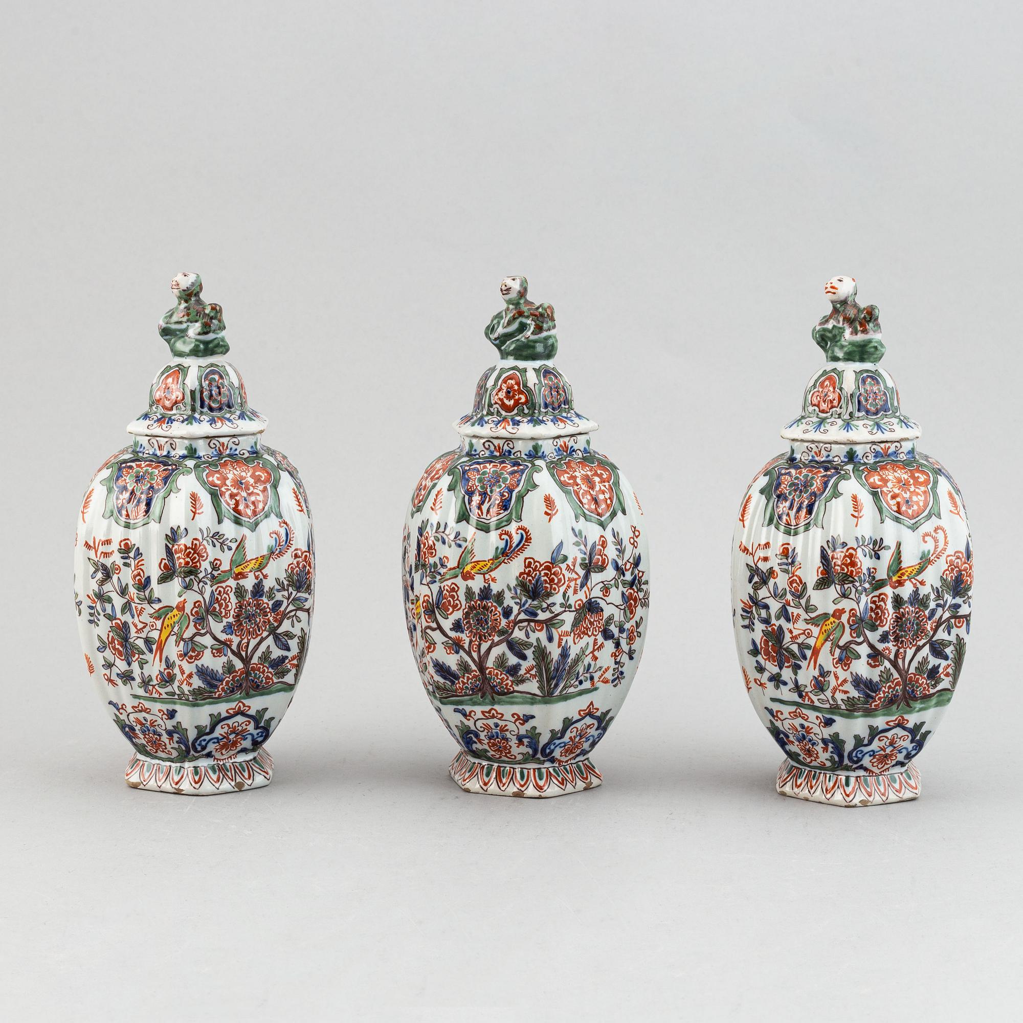 A five piece french faience garniture.
