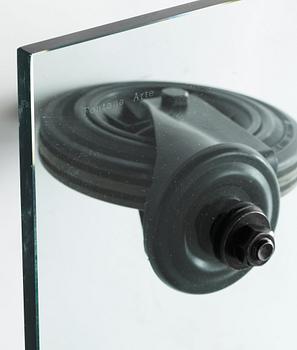 A Gae Aulenti 'Tavola con Ruote' table, Fontana Arte, Italy.
