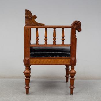 A late 19th century writing desk and armchair.