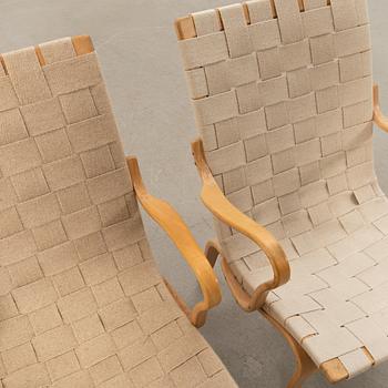 Bruno Mathsson, a pair of "Eva" armchairs, Bruno Mathsson Company, Värnamo, late 20th century.