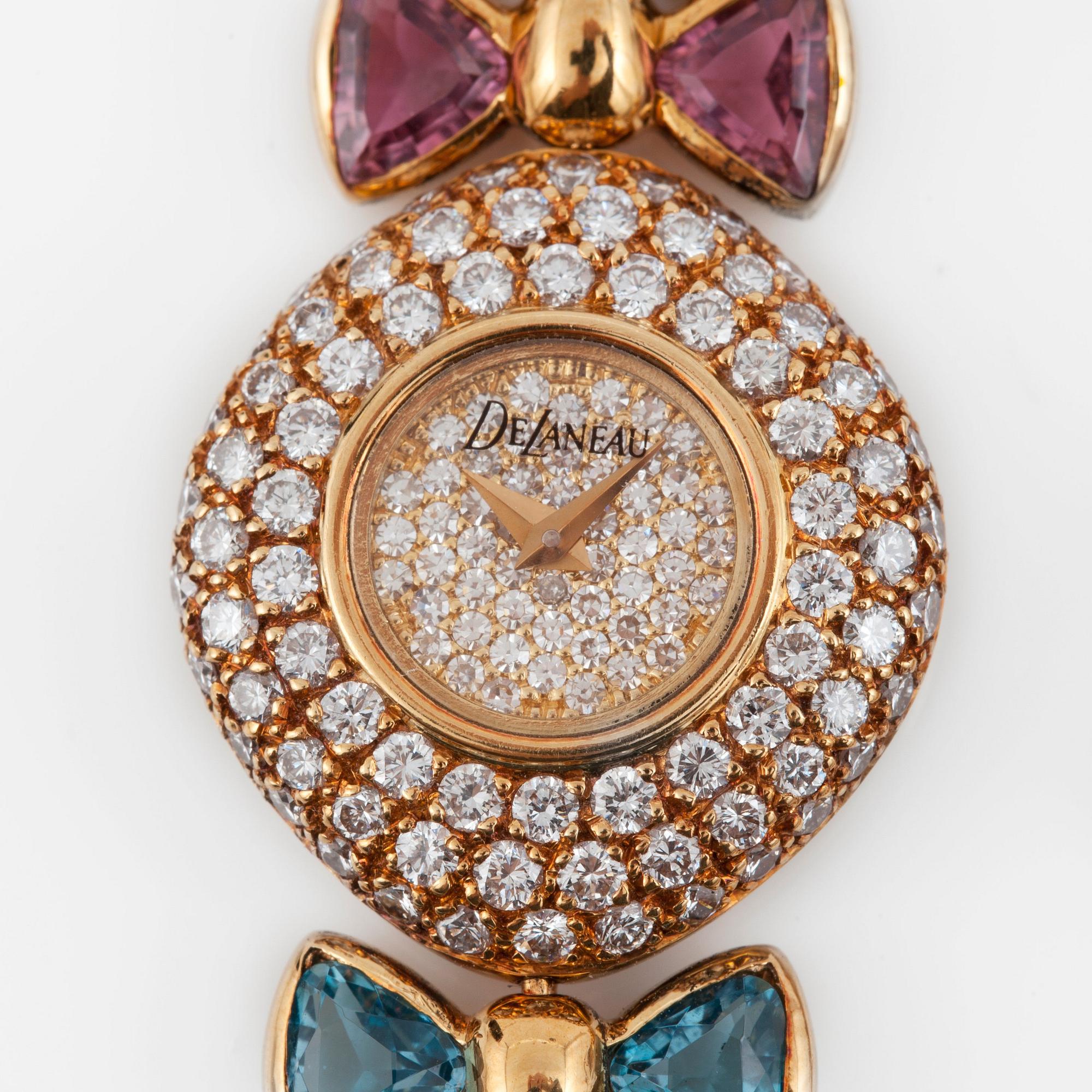 A DeLaneau ladies wristwatch set with brilliant-cut diamonds, pink topaz and aquamarine.