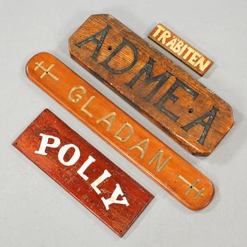 Four ship signs, 20th century.