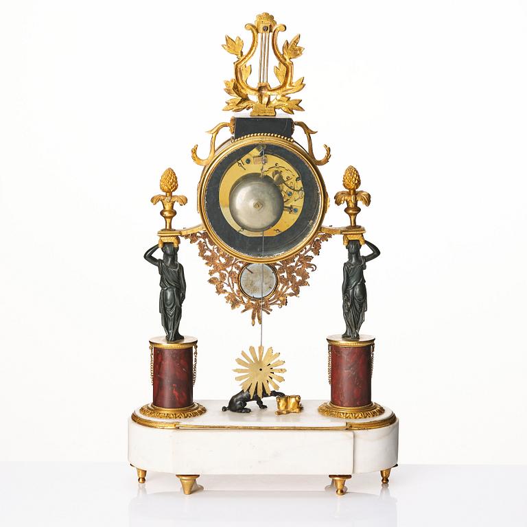 A late Gustavian marble and ormolu portico mantel clock, late 18th century.