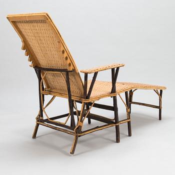 An early 20th century rattan lounge chair/sun chair.