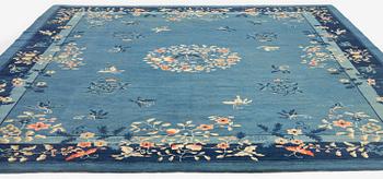 An antique Beijing carpet, northern China, c. 365 x 294 cm.