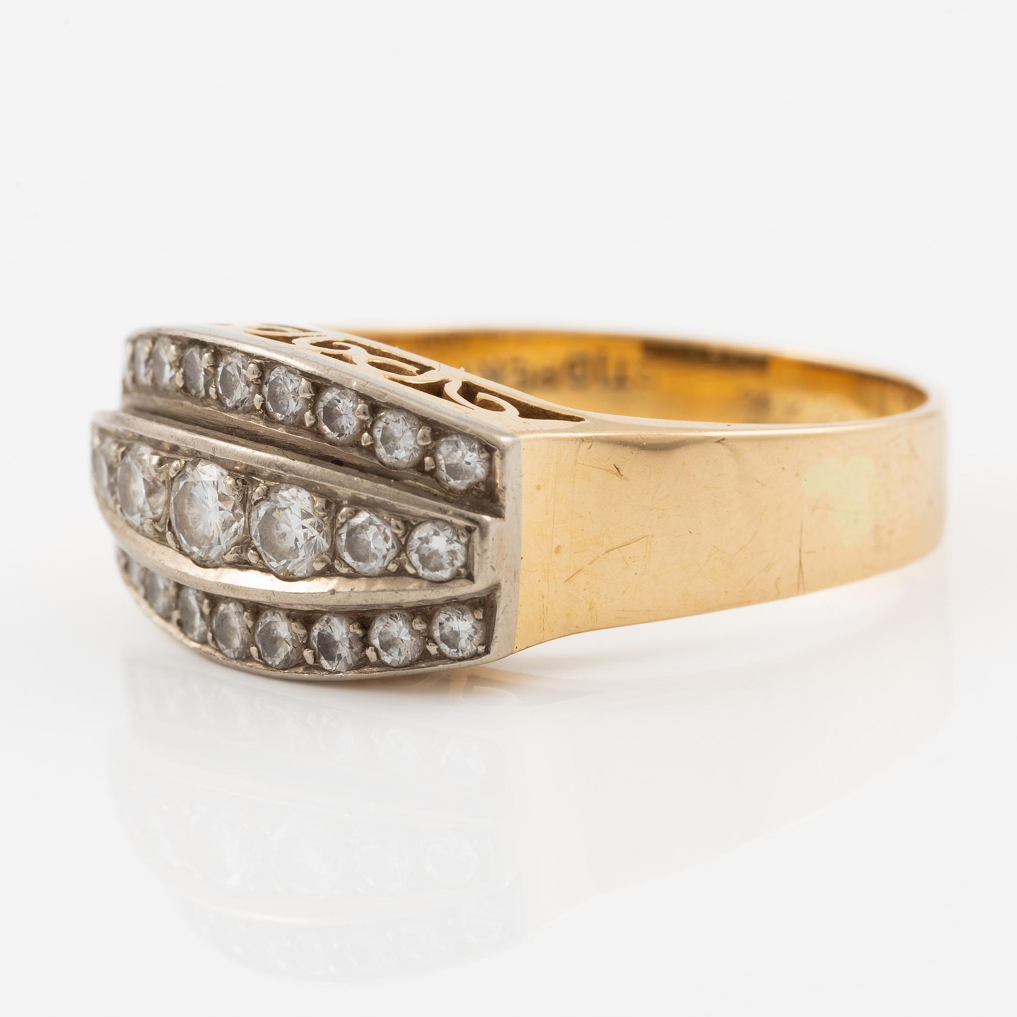 Ring in 18K gold set with round brilliant-cut diamonds, Stigbert.