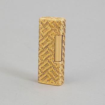 A Dunhill gold plated lighter.