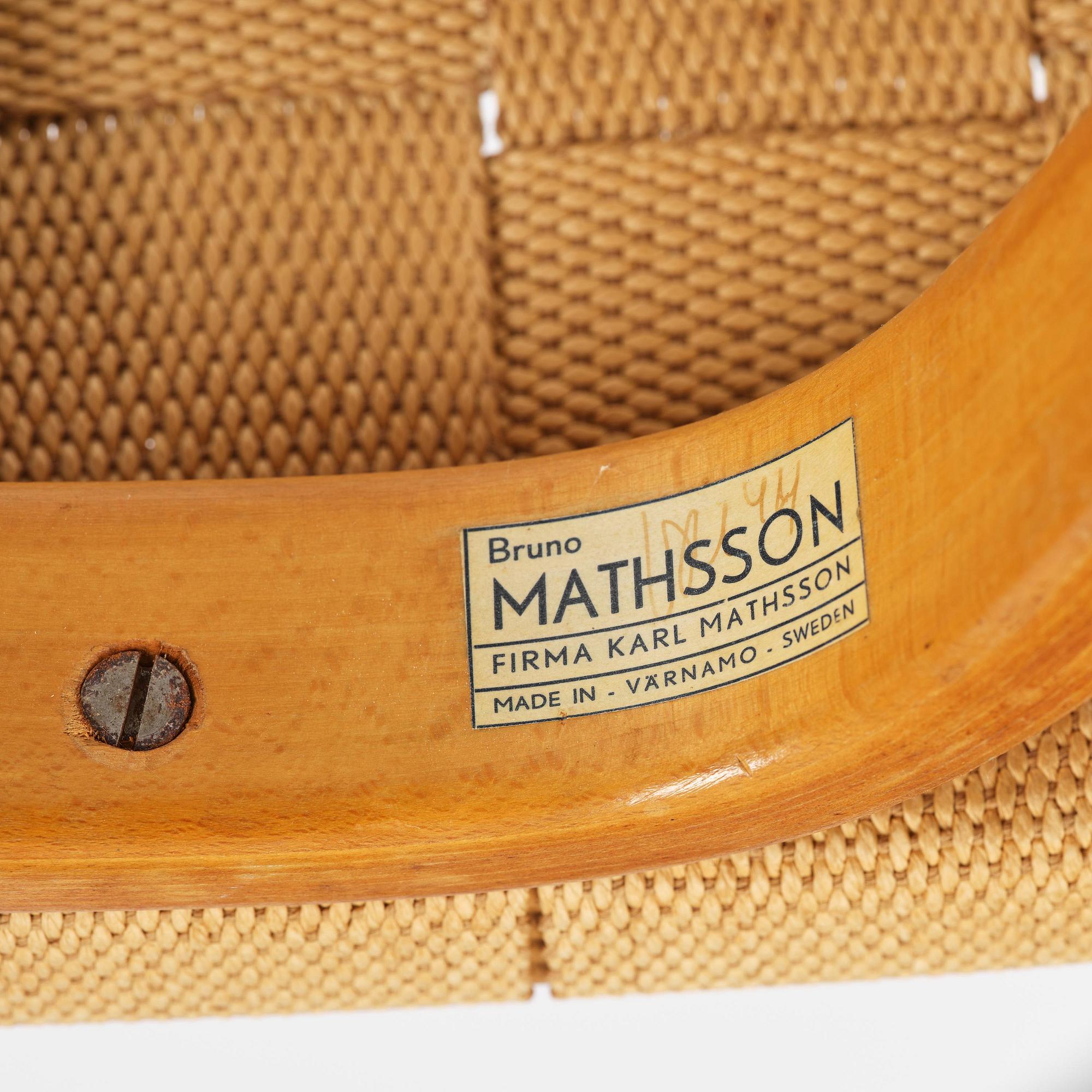 Bruno Mathsson, a lounge chair with wheels, Firma Karl Mathsson, Värnamo, 1940s, with reading table from 1972.