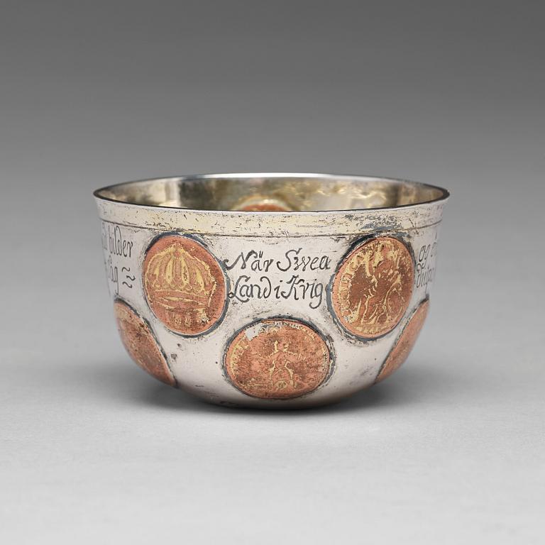 A Swedish 18th century parcel-gilt tumbler with copper coins, mark of Mikael Hammberg, Harnosand (-1758-1789(1790)).