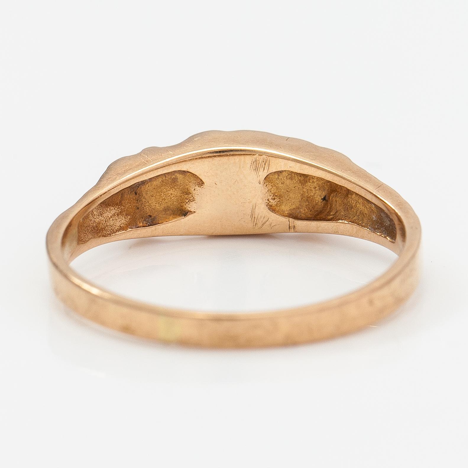 A 14K gold ring "Small word" with a cultured pearl. Lapponia 1978.