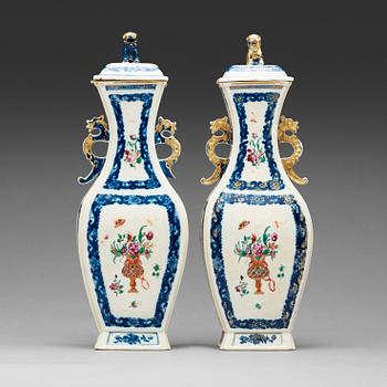 200. A pair of famille rose vases with cover, Qing dynasty, Qianlong (1736-95).