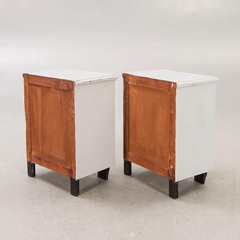 A pair of painted bedside table  first half of the 20th century.