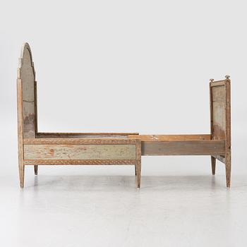 A Gustavian carved bedframe, late 18th century.