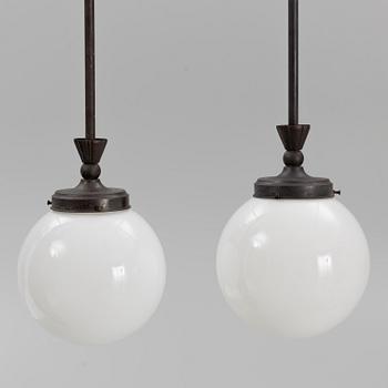 Harald Notini, taklampor ett par, modell "6185", Arvid Böhlmarks Lampfabrik, 1920-tal.