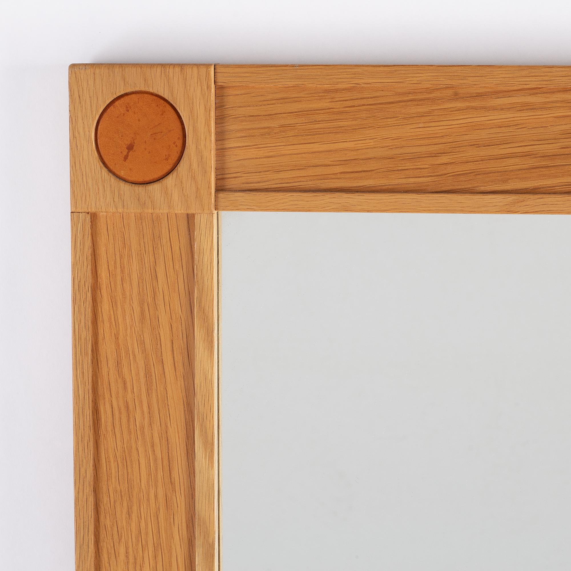 A 'Diplomat' oak mirror from Froseke, 1960's.